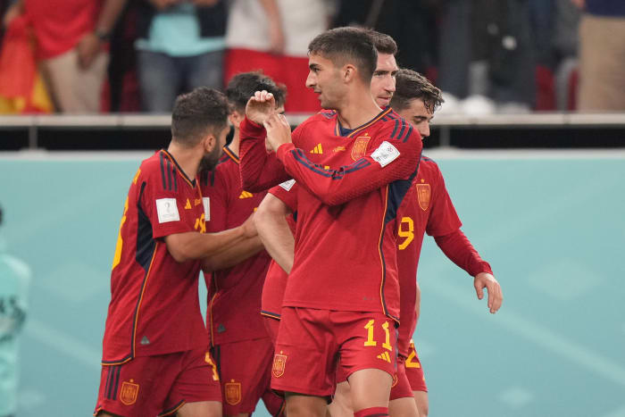 Ferran Torres pictured directing an "S" gesture towards his girlfriend, Sira Martinez, in the crowd after scoring in Spain's 7-0 win over Costa Rica at the 2022 World Cup in Qatar